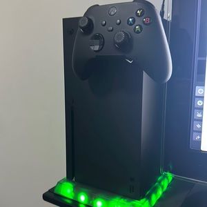 Xbox series x used with remote and hanger remote good condition 1TB w Box